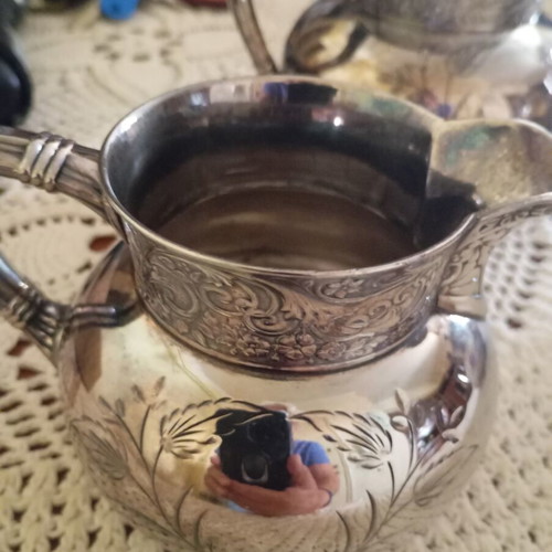 Antique silver plated teapot, sugar bowl and creamer like new