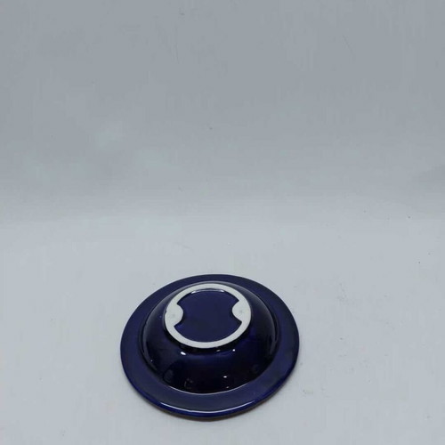Porcelain ashtray used, blue shade with flowers and yellow details