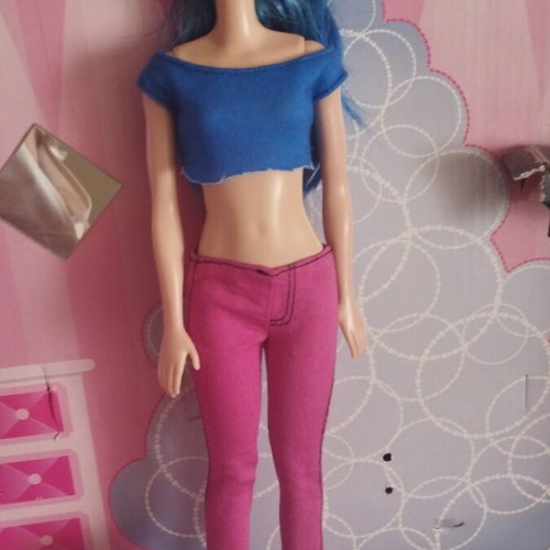 Barbie doll with blue hair