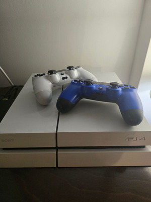 Sony PS4 white like new with 2 controllers