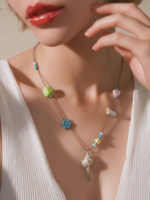 Handmade necklace with gold-plated shell like new