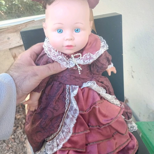 Doll with Victorian dress used, soft body, plastic head