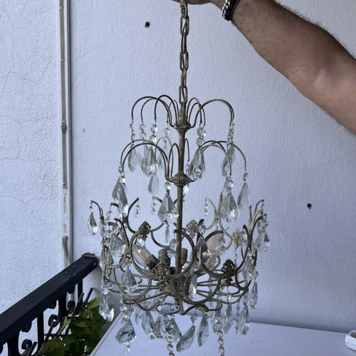 Bulgari crystal ceiling lights used with gold patina, two six-light and one single-light