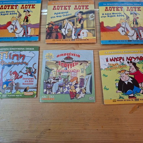 Collection of 10 children's animated DVDs with cases, dubbed