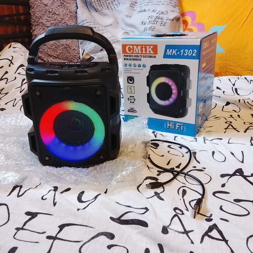 Mini Bluetooth Speaker like new with flashlight colors and karaoke