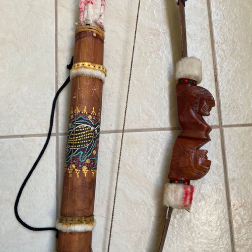 Decorative ethnic bow set with quiver and arrows used