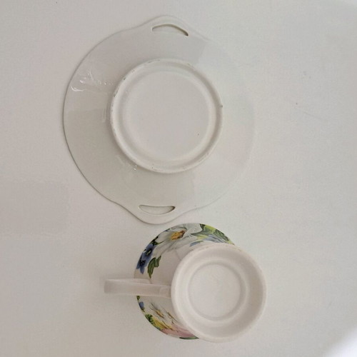 Porcelain cup and saucer set like new