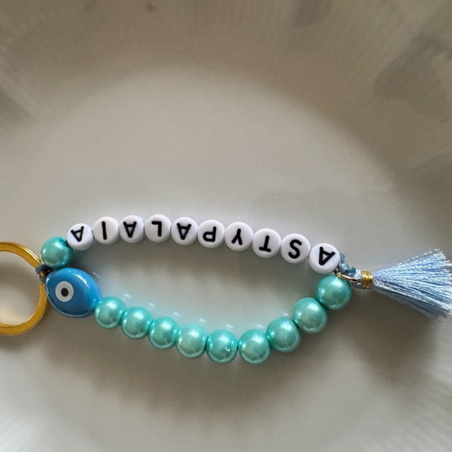 Keychain with beads new, white and blue