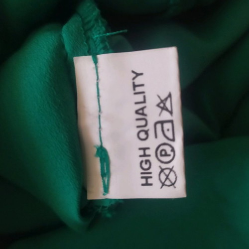 Green dress used, size 56, excellent condition