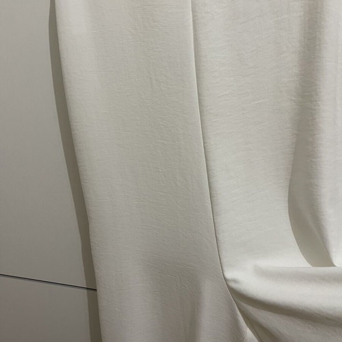 Zara white wide-leg jumpsuit with shoulder pads
