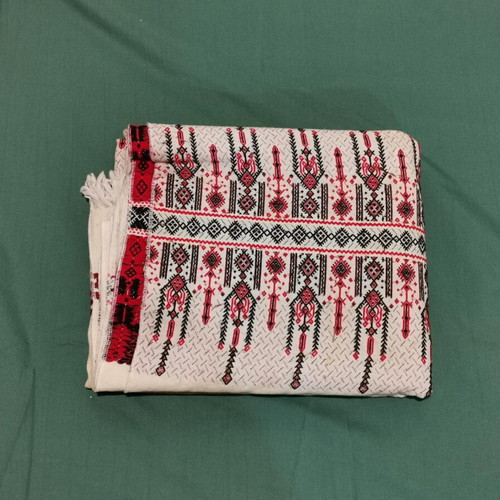 Woven bed sheet used with stain and wear from 1930 era