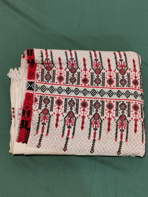 Woven bed sheet used with stain and wear from 1930 era