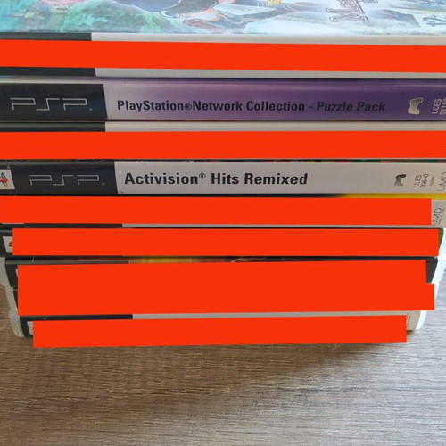 Sony PSP games used, Puzzle Pack and Activision Hits Remixed