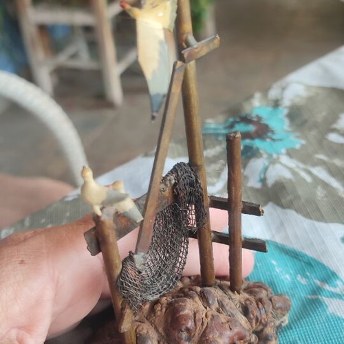 Vintage sea-themed decoration handmade from metal and cork used