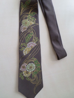 Vintage silk tie with handmade embossed painted designs like new