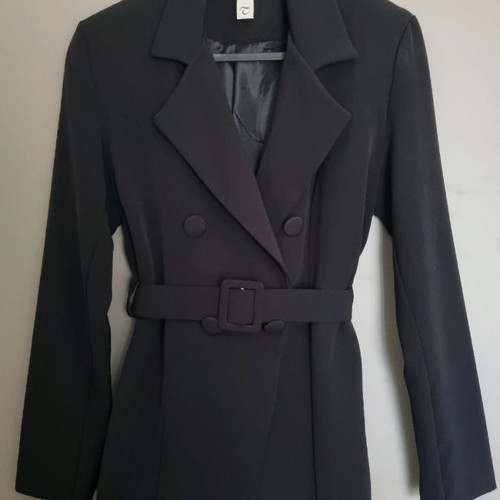 Black suit used, made in Italy, size Large