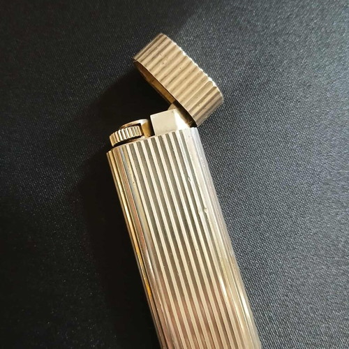 Cartier lighter used silver with vertical grooves