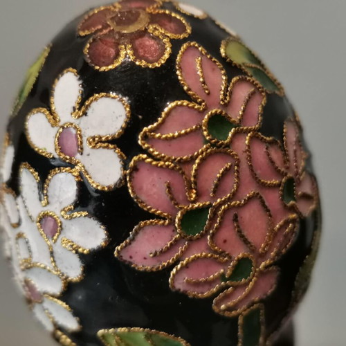 Cloisonne egg used with white and pink cherry blossoms on wooden base