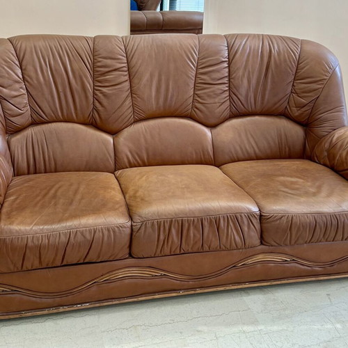 Leather three-seater sofa used, brown color