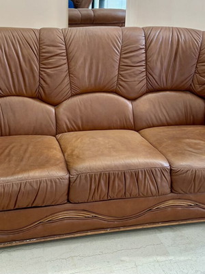 Leather three-seater sofa used, brown color