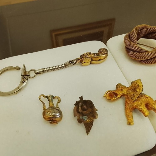 Vintage jewelry collection used, pins, brooches, and keychains