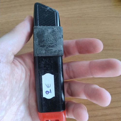 Utility knife with blade and spring used
