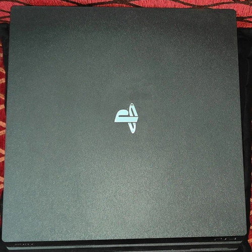 PlayStation 4 Pro 1TB like new with controller and 2 games