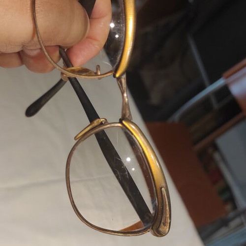 Vintage eyeglasses used, gold color with old case