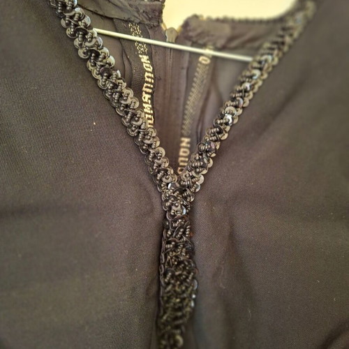 Woolen black vintage dress used with long sleeves and zipper