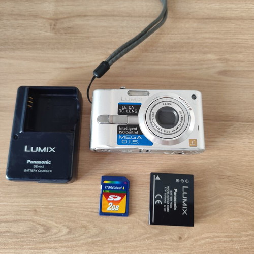 Panasonic Lumix DMC-FX12 digital camera used with accessories