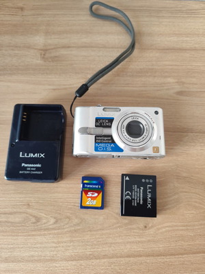 Panasonic Lumix DMC-FX12 digital camera used with accessories