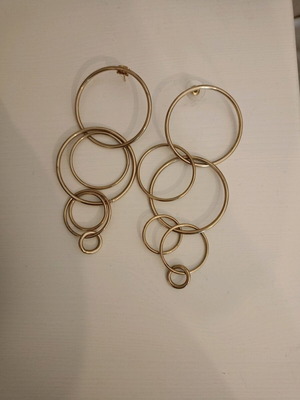 Earrings hoops braided together like new