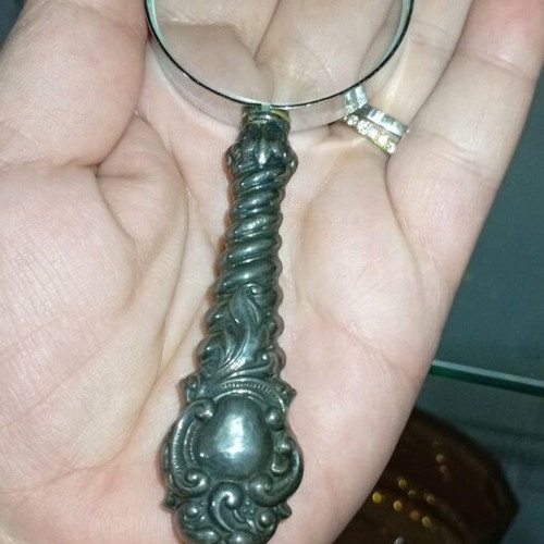 Antique magnifying glass like new with ornate designs