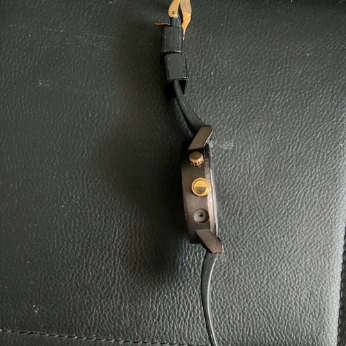 Ouzoo watch used for parts or repair