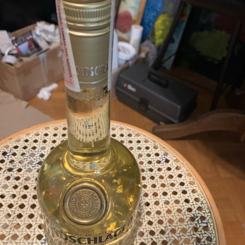 Goldschlager bottle like new with gold leaf bits collectible