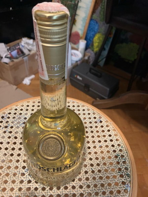 Goldschlager bottle like new with gold leaf bits collectible