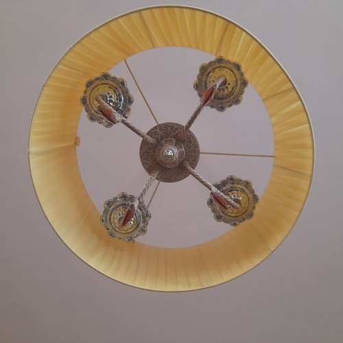 Ceiling light with brass parts and yellow lampshade