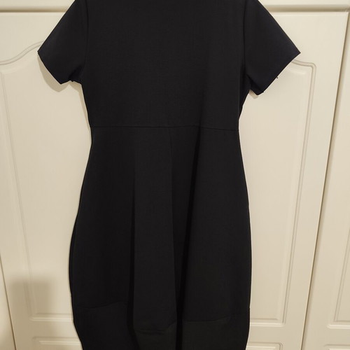 Black midi dress with pockets and asymmetrical design, one size