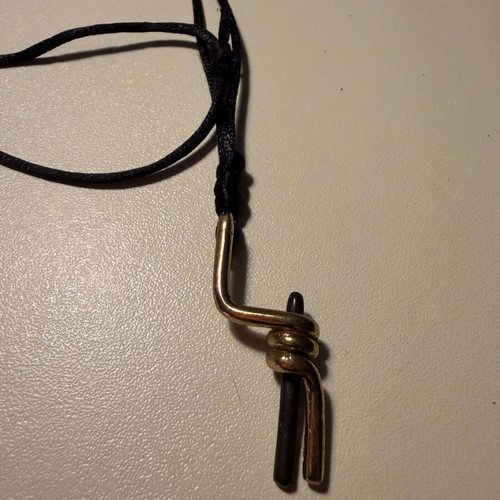 Handmade long steel pendant in gold and black like new