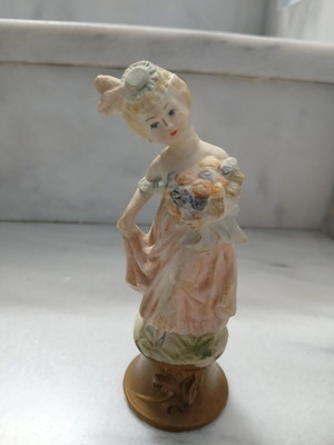 Vintage decorative figurine small lady with atmospheric details