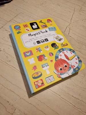 Magnetic toy used with daily routines and time learning