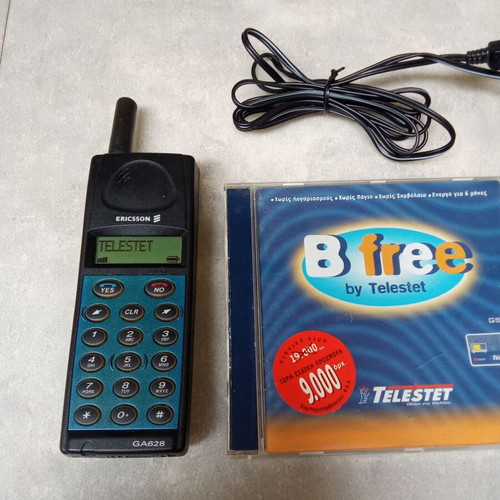 Ericsson GA 628 mobile phone used, vintage collectible with charger and cards