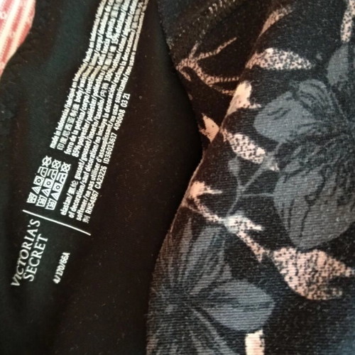 Victoria's Secret leggings used, black with multicolor pattern, size S