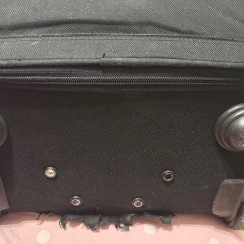 Benetton fabric black suitcase used with two wheels
