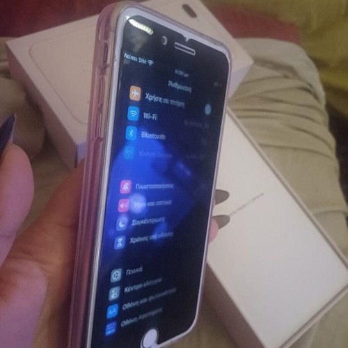 iPhone 8 Plus 64GB used with charger, headphones, 4 cases, 5 screen protectors
