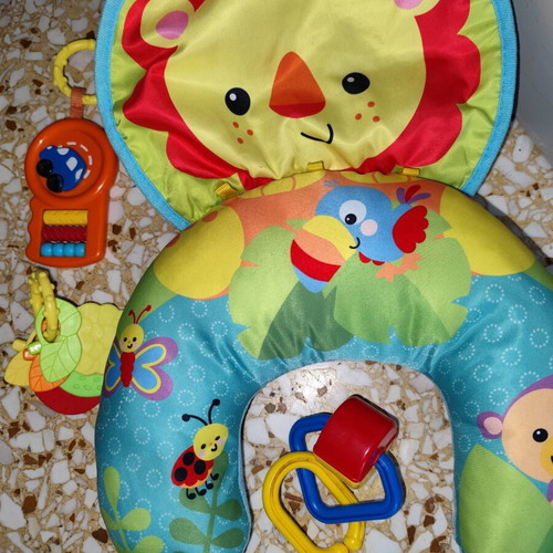Activity Pillow for Babies like new with hanging toys