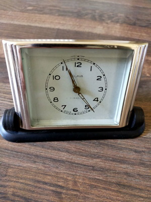 Slava mechanical table clock used, analog display