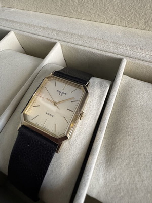 Orient VX Quartz watch, vintage gold rectangular case, brown leather strap