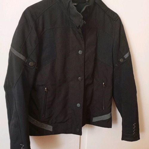 Dainese women's motorcycle jacket like new with protectors and thermal lining