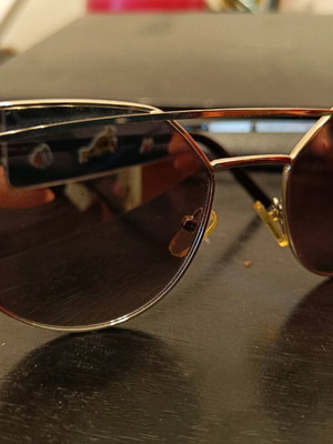 Cat eye sunglasses like new, silver mirror front, gray lenses, metal frame